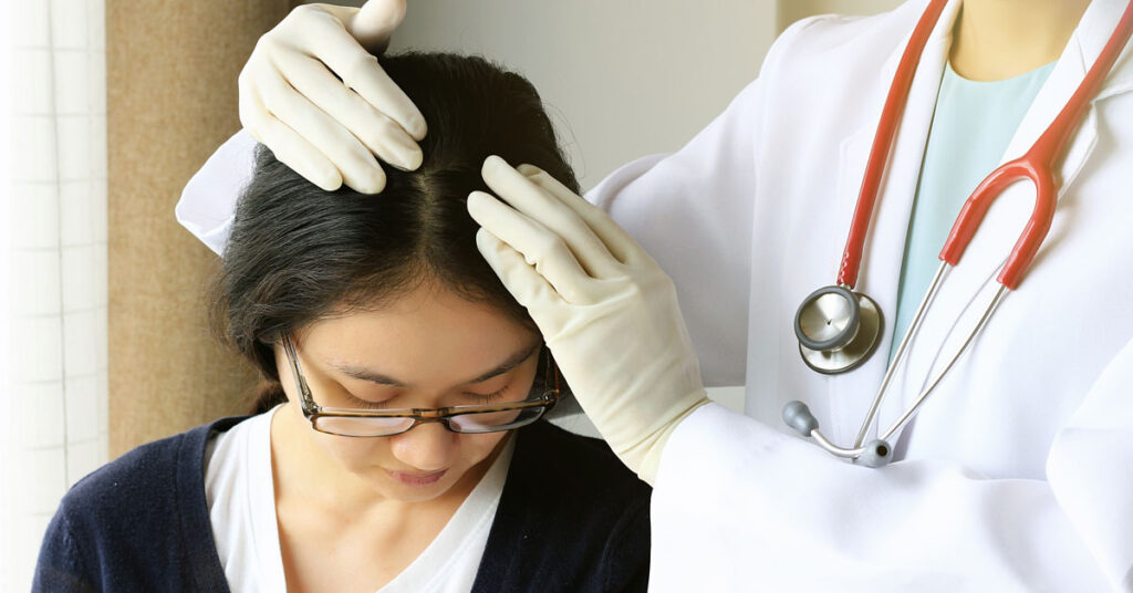 Hair health inspection to determine need for medicine or transplant.