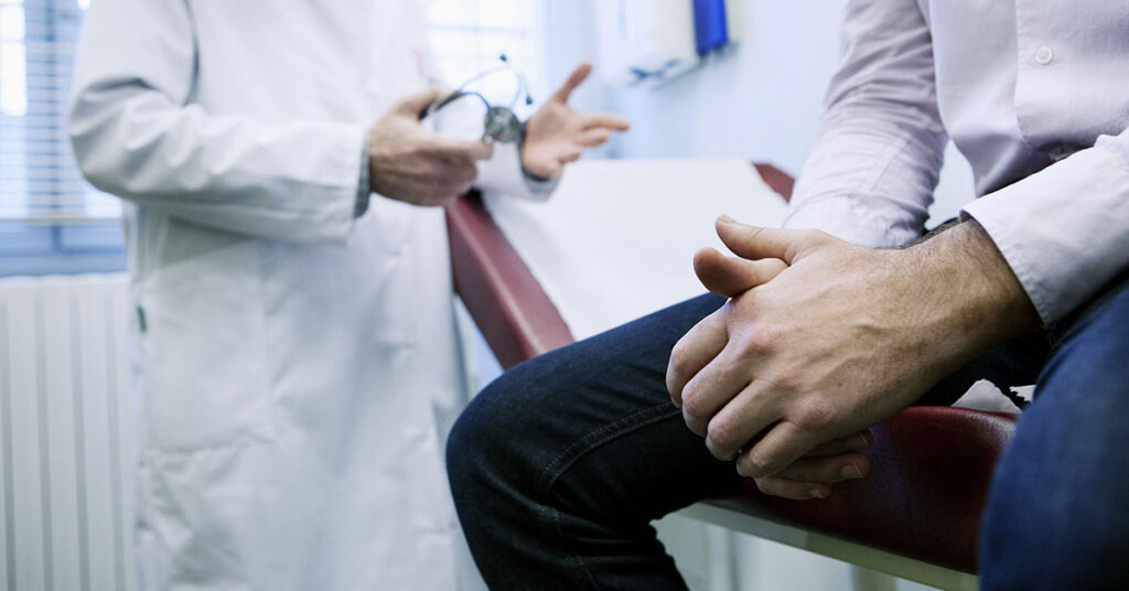 Man in with hair loss doctor