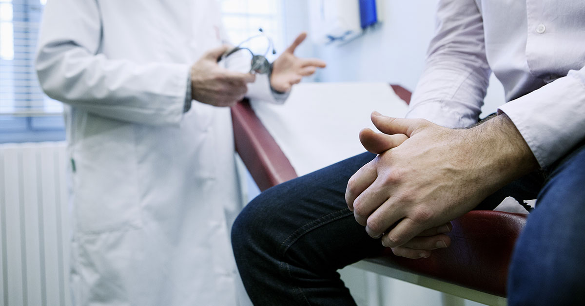 Man in with hair loss doctor