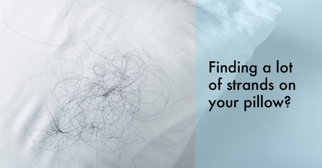 finding hair strands on your pillow