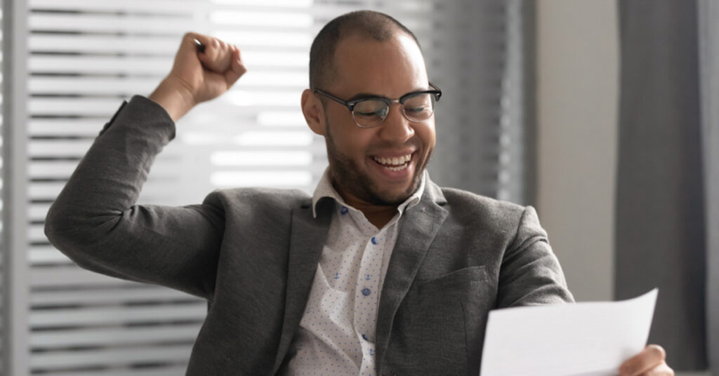 man with receding hairline gets his tax returns