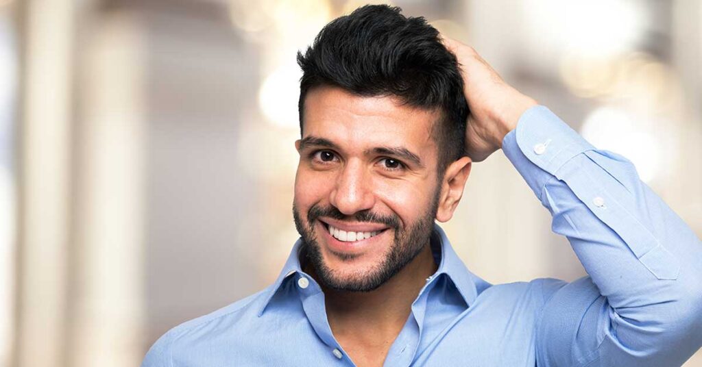 man with full healthy hair